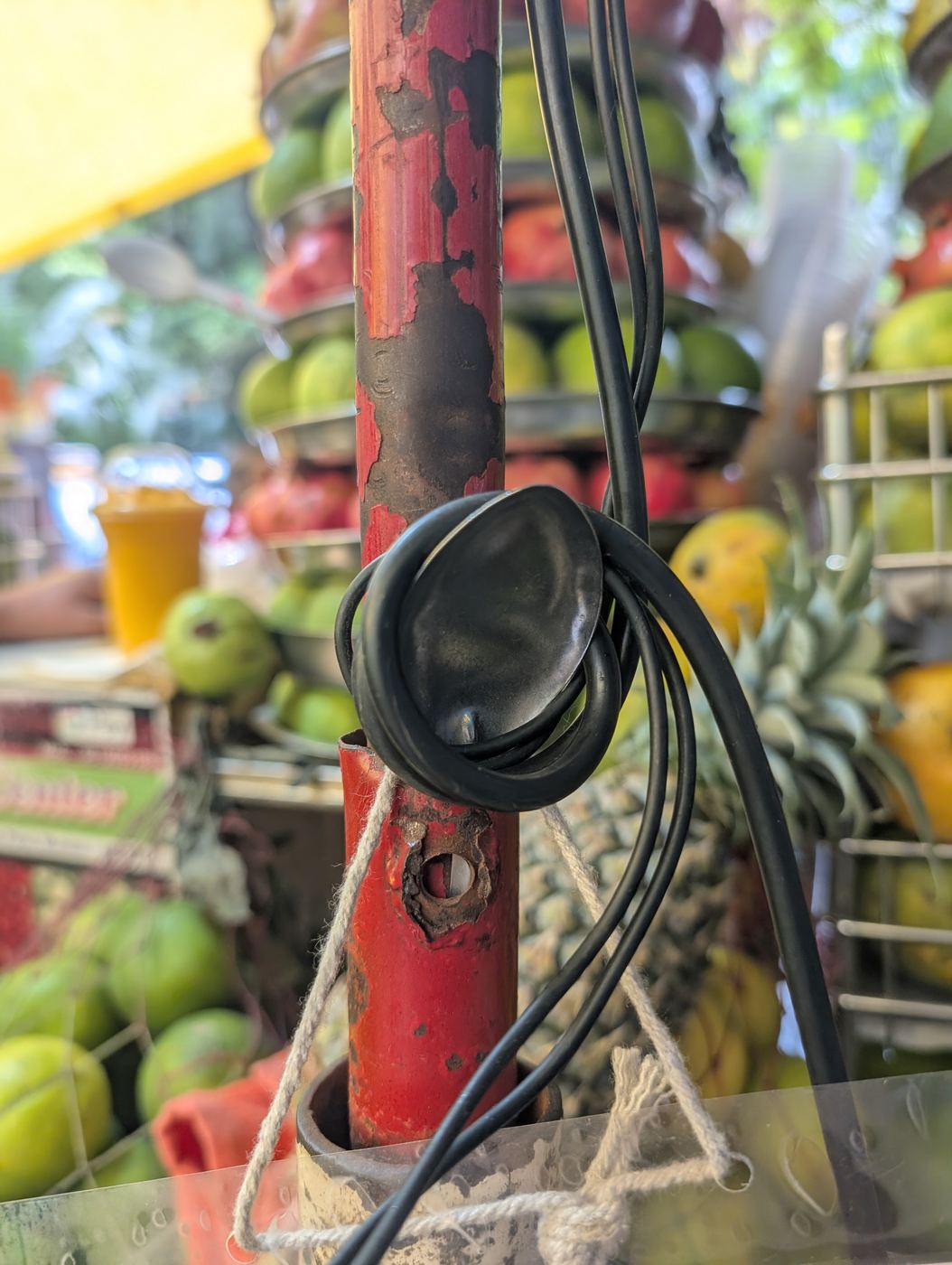 A spoon used as a spindle for a cable roll