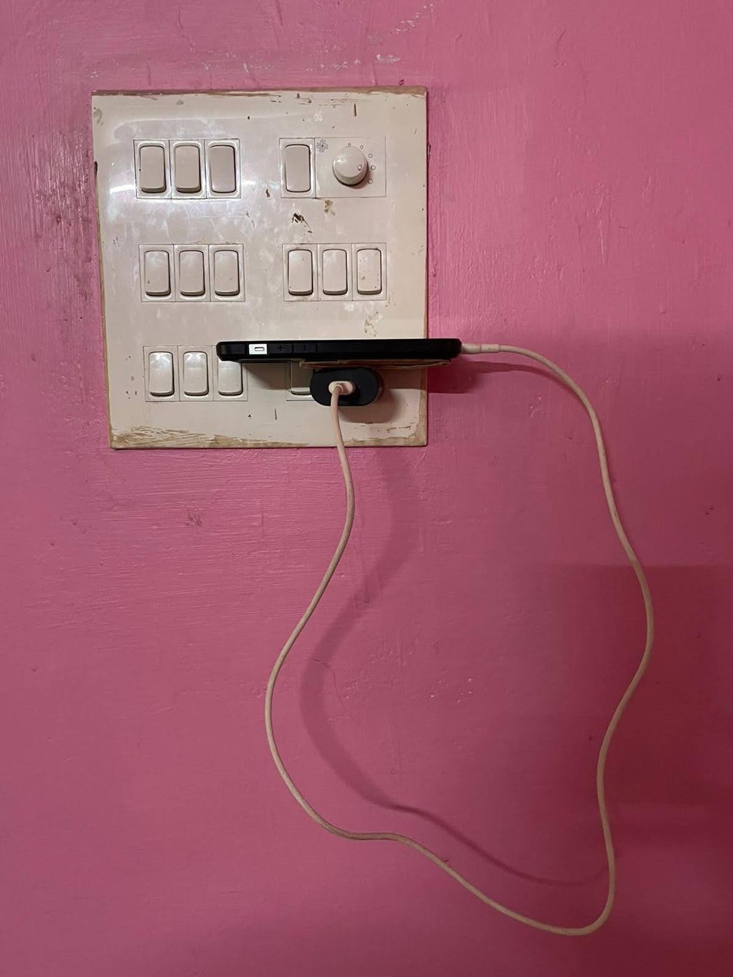 A power socket used to rest a phone